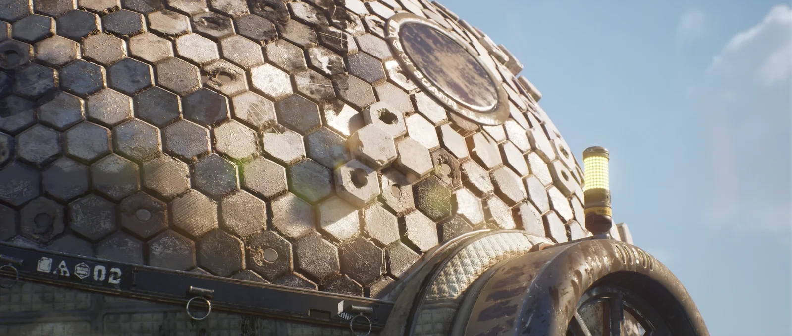 Close-up of weathered hexagonal dome panels, a circular window, entrance trim, and a yellow signal light